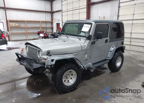 2000 Jeep Wrangler Sport z USA, uszkodzony, nr VIN 1J4FA49S2YP797321